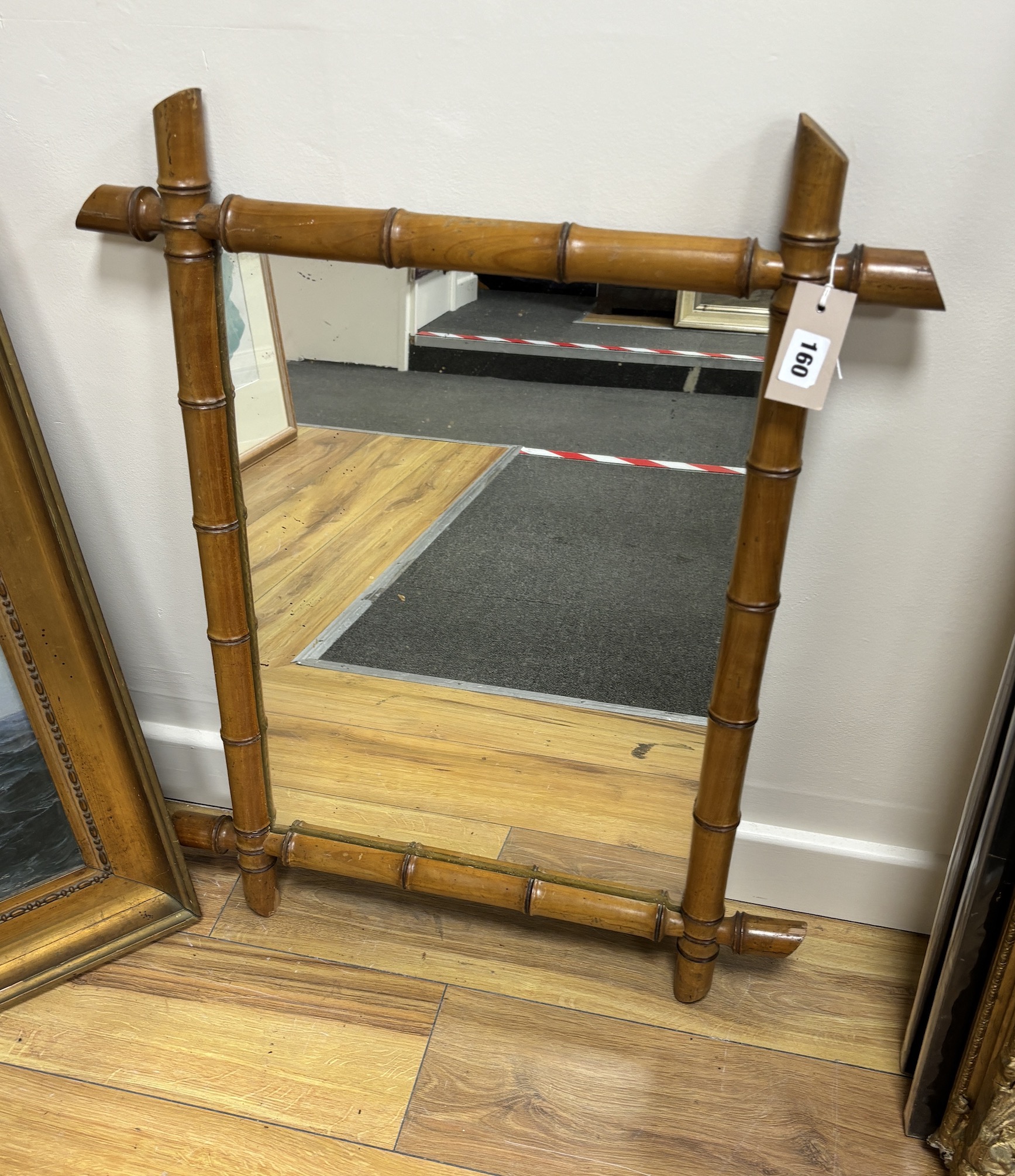 A late 19th/ early 20th century French rectangular simulated bamboo cherry wall mirror, width 56cm, height 72cm